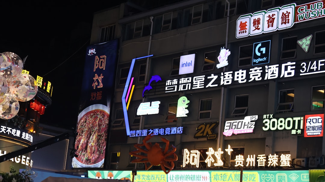 bright-neon-signs-illuminate-a-building-at-night-1amck2cyw5m